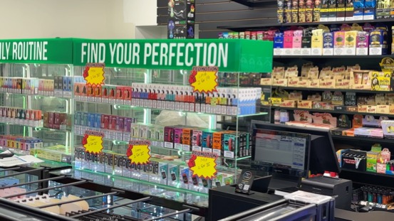 Front counter vape wall with promotion starbursts